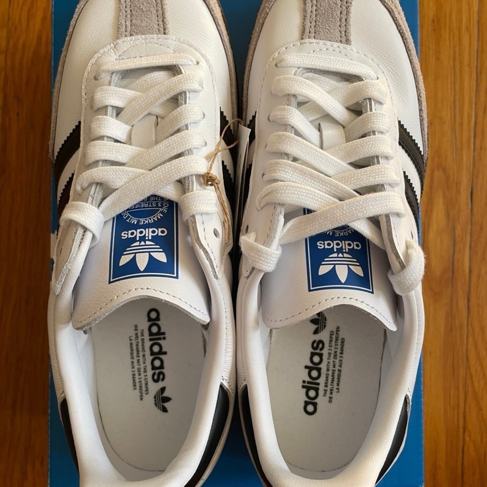 Adidas Women’s White and Black Striped Sneakers